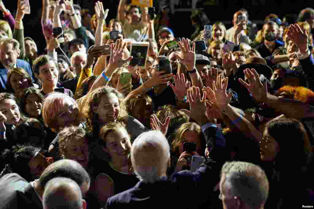 U.S. President Joe Biden greets supporters during a campaign rally for Democratic incumbent Governor Kathy Hochul and other New York Democrats in Yonkers, New York, Nov. 6, 2022. 