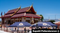 American-Thai voters line up to vote at a Mobile Vote Center in Wat Thai of Los Angeles during early Midterm Election2022 in Los Angeles, CA. The Mobile Vote Center Program of Los Angeles County implemented and takes a community-based approach and collab