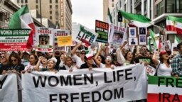 FILE - People in Los Angeles march to protest against the Iranian regime following the death of Mahsa Amini in the custody of the Islamic republic's 'morality police' on Oct. 22, 2022. 