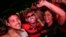 FILE - Fans of Flamengo react after winning the All-Brazilian 2022 Copa Libertadores final football match between Flamengo and Athletico Paranaense at the Botafogo neighborhood in Rio de Janeiro, Brazil, Oct. 29, 2022.