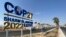 FILE: View of a COP27 sign on the road leading to the conference area in Egypt's Red Sea resort of Sharm el-Sheikh town, Egypt October 20, 2022. 