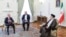 This handout picture provided by the Iranian presidential office shows Iran's President Ebrahim Raisi (R) meeting with Russia's Secretary of the Security Council Nikolai Patrushev in Tehran, Nov. 9, 2022. (Photo by Iranian Presidency/ AFP) 