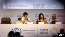 Sanaa Seif, sister of imprisoned British-Egyptian activist Alaa Abdel Fattah, center, attends a press conference hosted by the Global Campaign to Demand Climate Justice on the sidelines of the COP27 climate conference in Sharm el-Sheikh, Egypt, on Nov. 8, 2022.