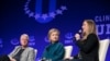 FILE - The Former U.S. President Bill Clinton, his wife and Former Secretary of State Hillary Clinton and their daughter Chelsea Clinton, speak at a 2014 Clinton Global Initiative University at Arizona State University in Tempe, March 22, 2014. 