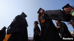 FILE - Boston College holds Commencement in Chestnut Hill in this undated photo.