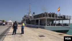 Somali migrant mother Rahma Abukar Ali was pregnant with baby daughter, Sophia, when they boarded the boat (shown here) in Libya, and she gave birth on a German Navy vessel in the Mediterranean, a day after she was rescued from the boat. (A. Osman/VOA)