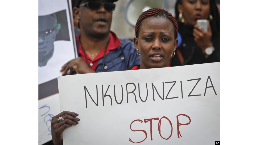 Burundi nationals from across the U.S. and Canada, along with supporters, demonstrate, calling for an end to atrocities, human rights violations in Burundi, outside U.N. headquarters in New York, April 26, 2016.