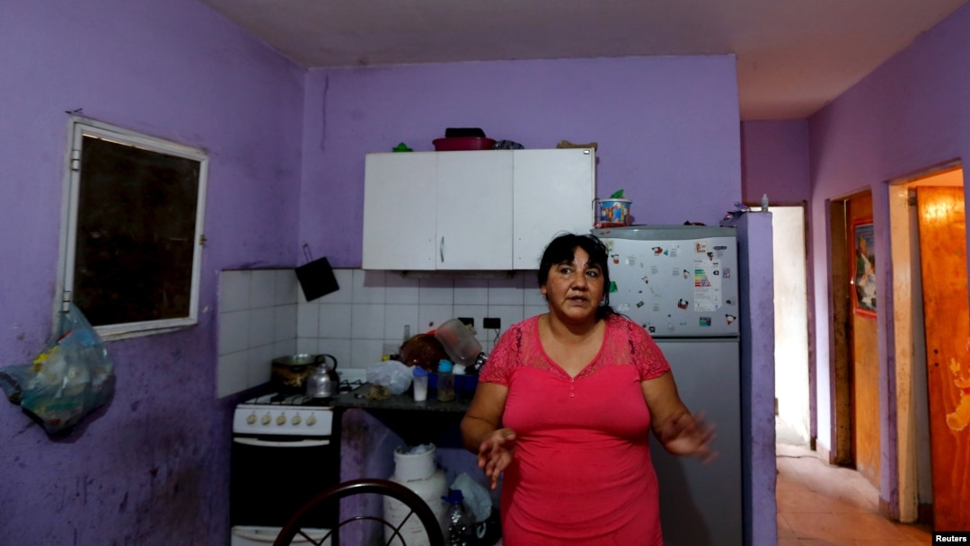 Catalina Benitez speaks during an interview with Reuters in her home in La Matanza, in the greater Buenos Aires area, July 29, 2015. 