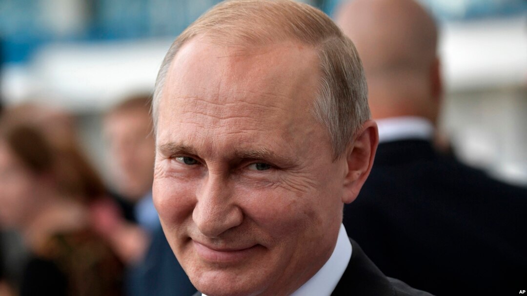 Russian President Vladimir Putin smiles as he visits the Kaliningrad Stadium after the 2018 soccer World Cup in Kaliningrad, Russia, July 20, 2018.