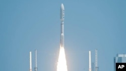 The Juno spacecraft launched aboard an Atlas V rocket from Space Launch Complex 41 at Cape Canaveral Air Force Station in Florida on Friday, Aug. 5, 2011