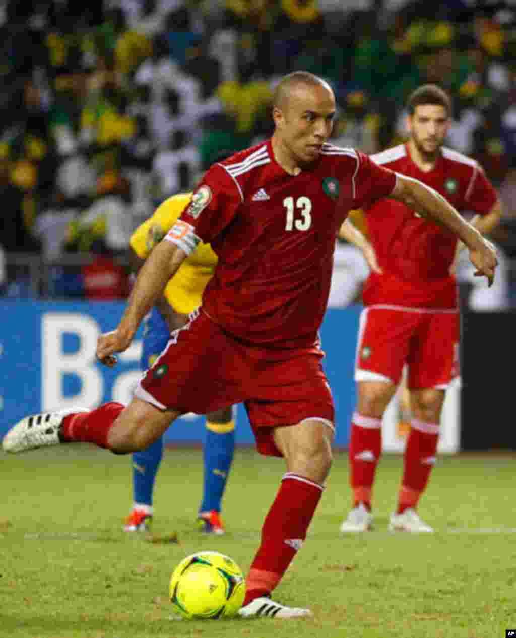 Morocco's Kharja takes a penalty kick against Gabon during their African Cup of Nations soccer match in Libreville