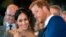 FILE - Britain's Prince Harry and Meghan Markle watch a dance performance in Cardiff, Wales, Jan. 18, 2018. 
