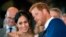 FILE - Britain's Prince Harry and Meghan Markle watch a dance performance by Jukebox Collective Cardiff Castle in Cardiff, Wales, Jan. 18, 2018. 