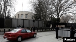 Riot police secure the roads around U.S. Embassy in Ankara, Turkey, March 5, 2018. 