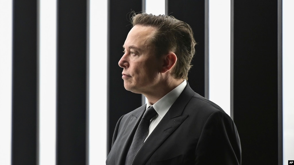 FILE - Elon Musk, Tesla CEO, attends the opening of the Tesla factory Berlin Brandenburg in Gruenheide, Germany, March 22, 2022. Musk has offered to buy social media service Twitter. (Patrick Pleul/Pool via AP)