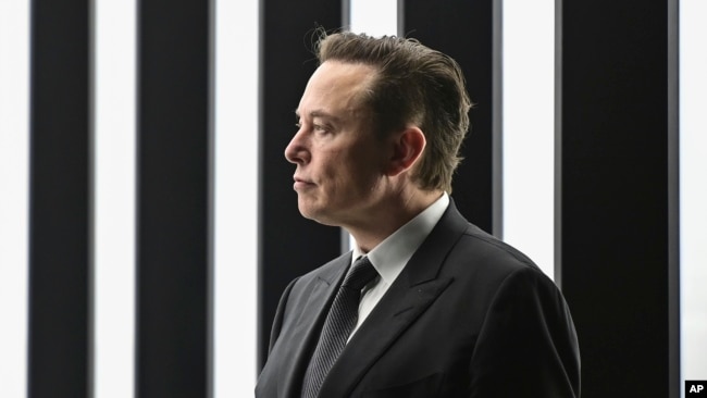FILE - Elon Musk, Tesla CEO, attends the opening of the Tesla factory Berlin Brandenburg in Gruenheide, Germany, March 22, 2022. Musk has offered to buy social media service Twitter. (Patrick Pleul/Pool via AP)