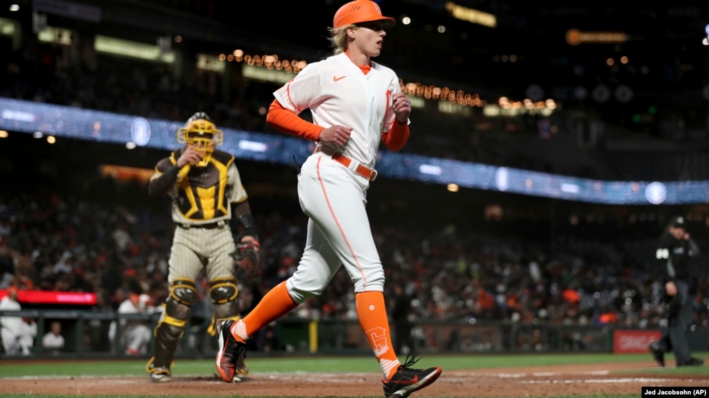 San Francisco Giants first base coach Alyssa Nakken runs to get in position at a baseball game in San Francisco, Tuesday, April 12, 2022.
(AP Photo/Jed Jacobsohn)
