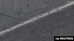 A satellite image shows an overview of tanks on road south of Izyum, Ukraine, March 24, 2022. (2022 Maxar Technologies/Handout via Reuters)