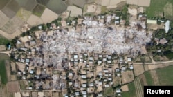 MYANMAR-POLITICS/BURNINGAn aerial view of Bin village of the Mingin Township in Sagaing region after villagers say it was set ablaze by the Myanmar military, in Myanmar February 3, 2022. Picture taken February 3, 2022. Picture taken with a drone. REUTERS/