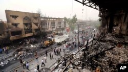 Мешканці і сили безпеки на місці терористичної ататки в Багдаді