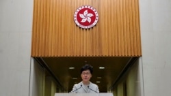 Hong Kong Chief Executive Carrie Lam speaks during a press conference in Hong Kong, Tuesday, Nov. 26, 2019. Lam has refused to offer any concessions to anti-government protesters after a local election setback. (AP Photo/Vincent Yu)