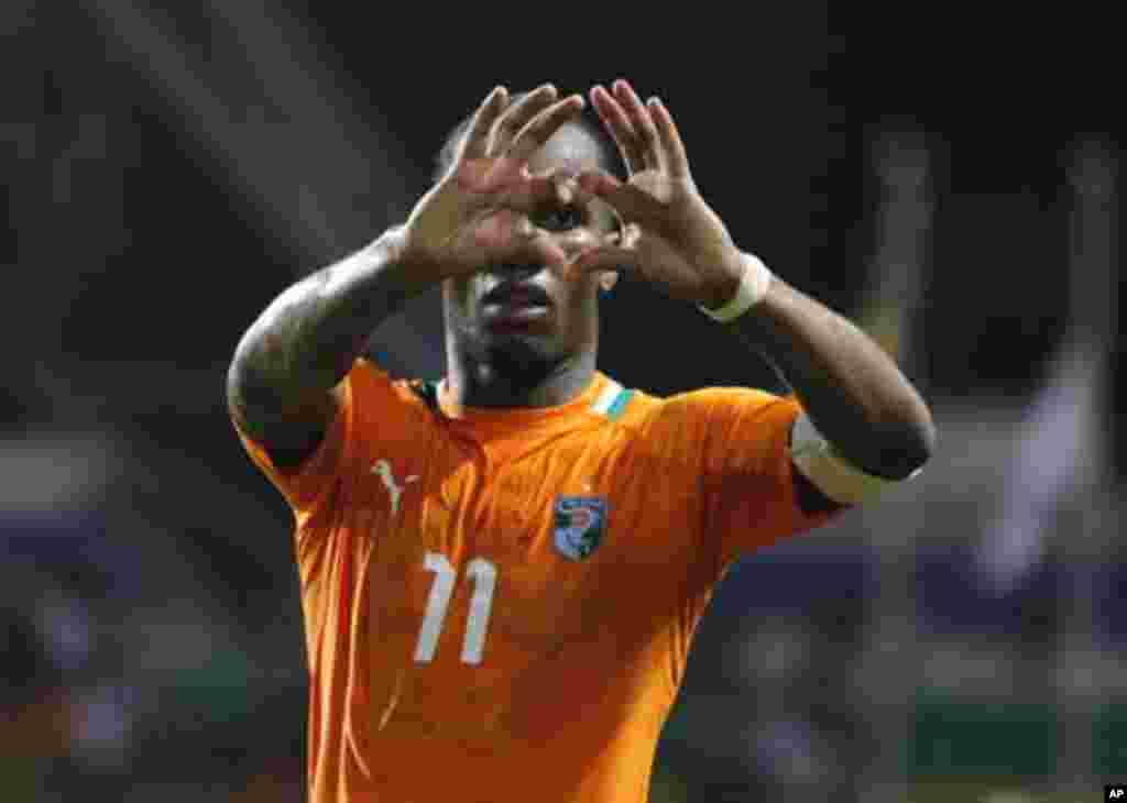 Ivory Coast's Didier Drogba celebrates after they won their African Nations Cup semi-final soccer match against Mali at the Stade De L'Amitie Stadium in Gabon's capital Libreville February 8, 2012.