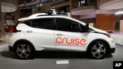 In this Jan. 16, 2019, file photo, Cruise AV, General Motor's autonomous electric Bolt EV is displayed in Detroit. (AP Photo/Paul Sancya, File)