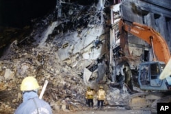 This undated photo provided by the FBI shows damage to the Pentagon caused during the 9/11 attacks. This photo and others disappeared from the FBI website for a time because of a technical glitch. A bureau spokeswoman said she didn't know how long the photos weren't visible.