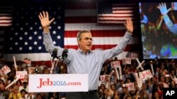 Former Florida Gov. Jeb Bush takes the stage as he formally join the race for president, Monday, June 15, 2015, at Miami Dade College in Miami. (AP Photo/David Goldman)