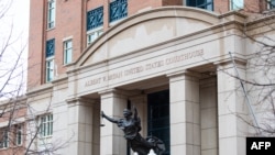 FILE - The Albert V. Bryan Federal Courthouse is seen during the trial of IS member El Shafee Elsheikh, the 'Beatle', in Alexandria, Virginia, on April 5, 2022. 