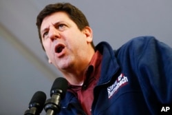 FILE - Steve Dettelbach, then a candidate for Ohio Attorney General, speaks during a campaign rally, in Columbus, Ohio, Nov. 5, 2018.