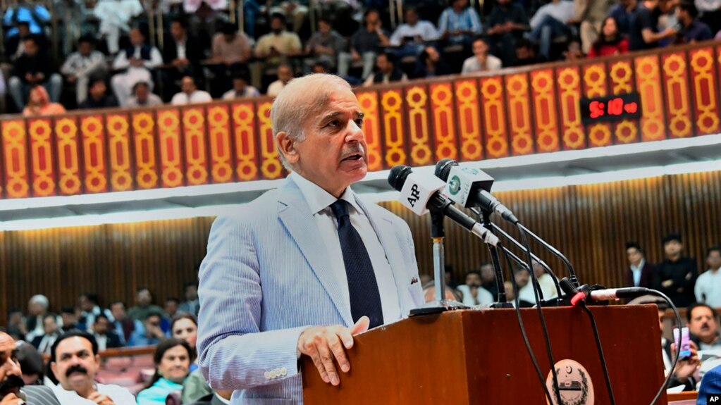 In this photo released by National Assembly of Pakistan, newly elected Pakistani Prime Minister Shahbaz Sharif addresses a National Assembly session, in Islamabad, Pakistan, Monday, April 11, 2022.