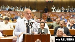 Pakistan's prime minister-elect Shehbaz Sharif speaks after winning a parliamentary vote to elect a new prime minister, at the national assembly, in Islamabad, Apr. 11, 2022. (Press Information Department (PID)/Handout via Reuters) 