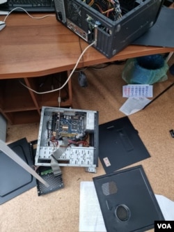 Computers with parts removed in office of State Agency of Ukraine for Exclusion Zone Management after Russian occupation, Chernobyl, April. 5, 2022. (Photo courtesy Evgen Kramarenko)