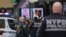 Law enforcement officers work near the scene of a shooting at a subway station in the Brooklyn borough of New York City, New York, U.S., April 12, 2022.
