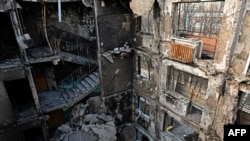 乌克兰城市哈尔科夫一座被部分摧毁的五层居民楼。(2022年4月10日)