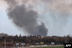 Smoke raises from the airport of Dnipro, April 10, 2022, amid Russian invasion of Ukraine.