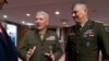 FILE - Gen. Stephen Townsend, commander of the U.S. Africa Command, right, with Gen. Kenneth McKenzie, commander of the U.S. Central Command, arrive at a Senate Armed Services Committee hearing on the readiness of the military in Africa and the Middle East on March 15, 2022.