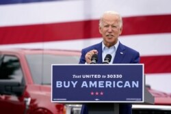 FILE - Democratic presidential candidate former Vice President Joe Biden speaks during a campaign event on manufacturing and buying American-made products at UAW Region 1 headquarters in Warren, Mich., Sept. 9, 2020.