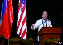 FILE - Philippine Defense Chief Delfin Lorenzana addresses military officers at the closing ceremony of the joint Philippines-U.S. military exercise dubbed "Balikatan 2017" (Shoulder-to-Shoulder), May 19, 2017, at Camp Aguinaldo in suburban Quezon city, northeast of Manila, Philippines.