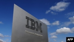 In this file photo taken on March 20, 2009, a sign marks the entrance to IBM Corporate Headquarters in Armonk, New York.