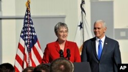 U.S. Vice President Mike Pence listens as Air Force Secretary Heather Wilson addresses USAF personnel at Cape Canaveral, Florida, Dec. 18, 2018.