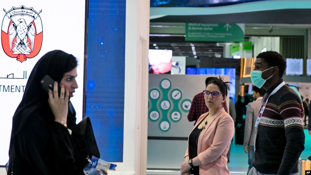 A man wears a mask as he visits the UAE ministry stand during the Arab Health Exhibition in Dubai, United Arab Emirates, Jan. 29, 2020. 