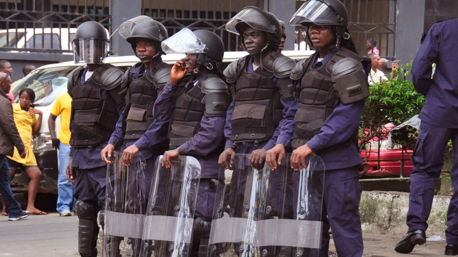 FILE - Liberia security forces in riot gear in the city of Monrovia, Liberia, Aug. 20, 2014. 