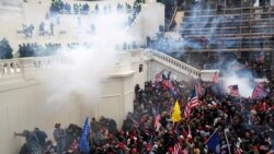 In this file photo, police release tear gas into a crowd of pro-Trump protesters during clashes at a rally to contest the certification of the 2020 U.S. presidential election results by the U.S. Congress, at the U.S. Capitol Building in Washington, U.S, January 6, 2021. (REUTERS/Shannon Stapleton)