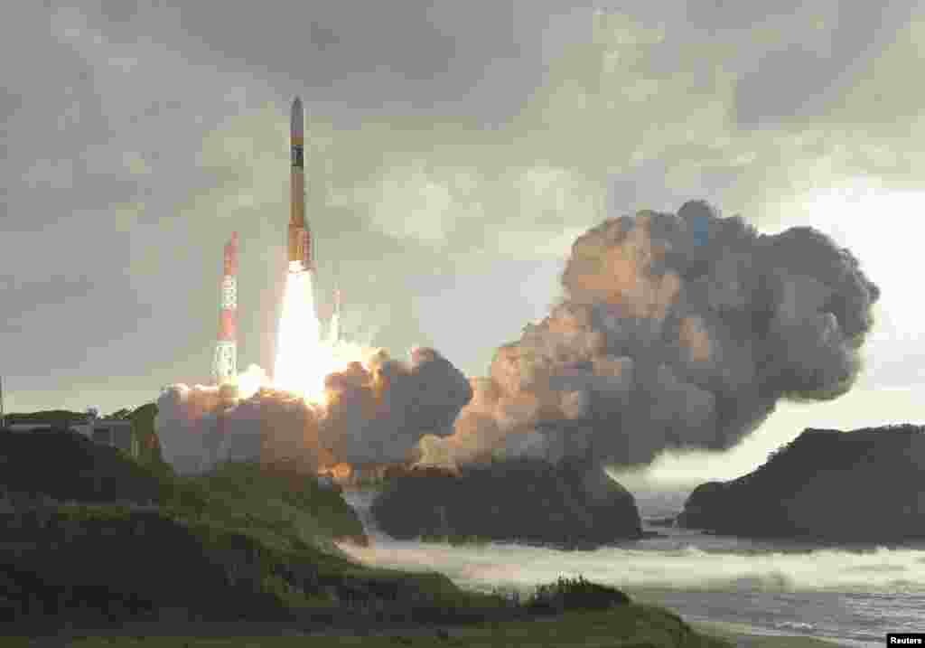 An H-2A rocket carrying Japan&#39;s fourth and final quasi-zenith satellite, the Michibiki No. 4, lifts off from the Tanegashima Space Center in Kagoshima Prefecture, southwestern Japan in this photo taken by Kyodo.
