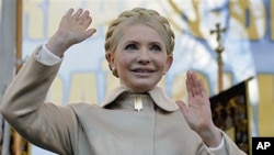 Former Ukranian Prime Minister and opposition leader Yulia Tymoshenko attends a rally in Kiev, Ukraine, January 22, 2011