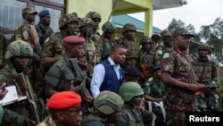 Major General Jeff Nyagah of the Kenya Defense Forces address the media during the withdrawal by the Congolese M23 rebels in Kibumba, near Goma, North Kivu province of the Democratic Republic of Congo, Dec. 23, 2022.