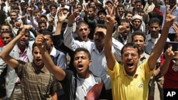 Students shout slogans during protests demanding the resignation of Yemen's President Ali Abdullah Saleh, Sana'a, September 18, 2011.