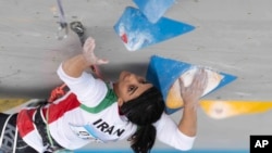 Iranian athlete Elnaz Rekabi competes during the women's Boulder & Lead final during the IFSC Climbing Asian Championships in Seoul, South Korea, Oct. 16, 2022. (Rhea Khang/International Federation of Sport Climbing via AP)